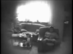 Voyeur recording a hot wife masturbating on a hidden cam in a living room